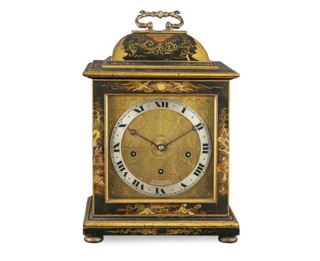 BLACK JAPANNED CHIMING BRACKET CLOCK, RETAILED BY HAMILTON &amp; INCHESEARLY 20TH CENTURY with a brass handle and cushion top