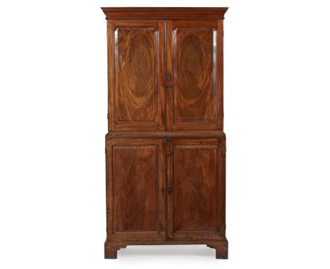 GEORGE III MAHOGANY ESTATE CUPBOARD18TH CENTURY the moulded cornice above a pair of panel doors opening to an interior fitted