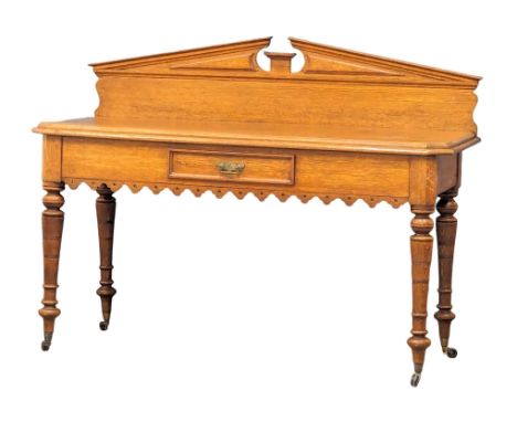 A large Victorian oak gallery back console table in the Gothic style. Circa 1880. 152x66x117cm 