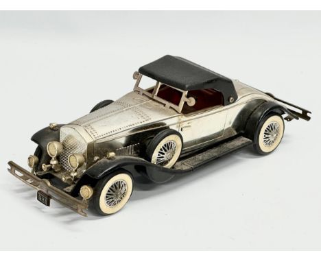 A vintage Rolls Royce Phantom battery operated car. 25cm 