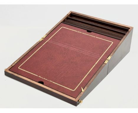 A Remi Martin cognac writing slope. 50.5cm open. 24x24.5x14.5cm closed. 