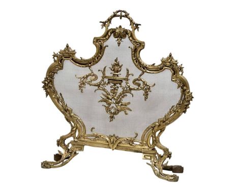 A vintage French 18th Century style Rococo brass firescreen with wire mesh panel. 70x79cm 