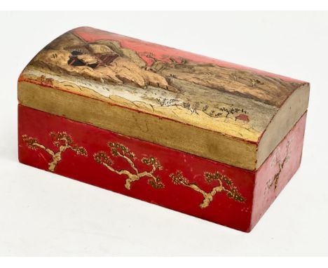 A Late 19th Century Japanese style tea caddy with embossed hand painted mountains, trees and pagodas. 19x11x8cm 