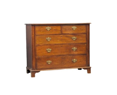A Late 19th Century walnut chest of drawers on bracket feet. 126x55x104cm 