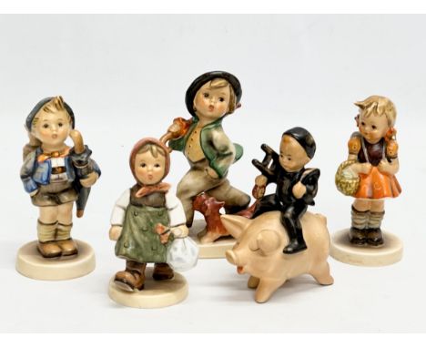 5 M.J. Hummel Goebel pottery figurines. 