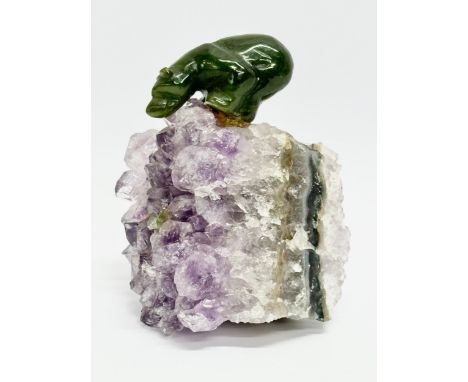 A Jade bear and salmon on carved amethyst base. 8x11cm 