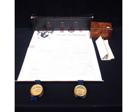 A CASED VICTORIAN 'GRANT OF ARMS' in leather case with two seals, with a wooden tea caddy