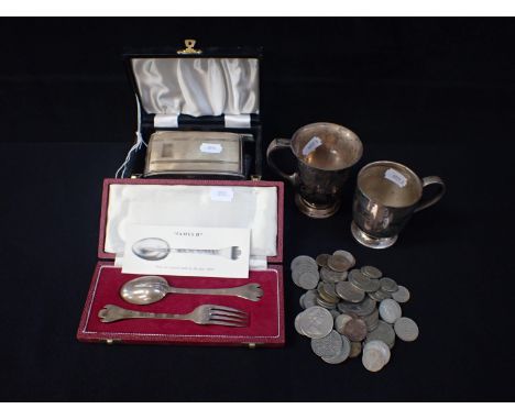 TWO SILVER CHRISTENING MUGS a cased trefid spoon and fork (reproduction), a cased silver-backed brush and comb set, and a few