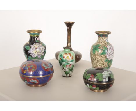 A CHINESE CLOISONNÃ‰ ENAMEL VASE with slender neck, floral filled and alternate colour roundels on a black ground, 15cm high,