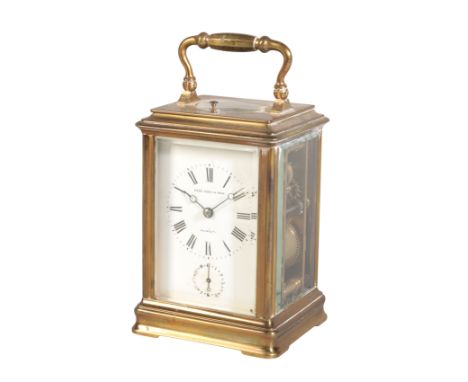 A FRENCH REPEATING CARRIAGE CLOCK 19th century, the white enamelled dial with Roman numerals, subsidiary alarm dial and marke