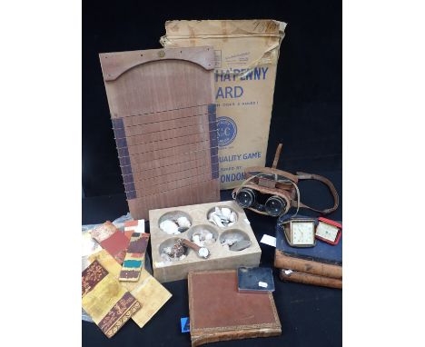 A WOODEN FIVE COMPARTMENT CASH TRAY a vintage shove ha'penny board, a pair of Mk IV issue binoculars, a 19th cent. m.s. book 