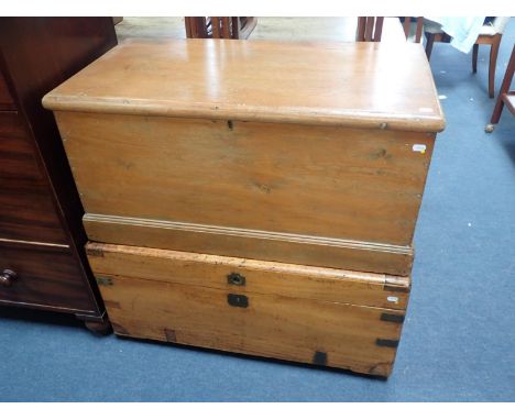 A METAL-BOUND CAMPHORWOOD TRUNK 19th century, 44cm high x 89cm wide; together with one other trunk, 43cm high x 88cm wide (2)