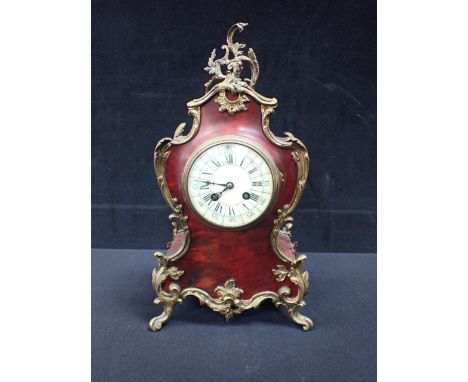 A 19TH CENTURY FRENCH TORTOISESHELL AND ORMOLU MANTEL CLOCK striking on a gong, 40cm high (dial a/f)