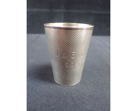 A SILVER ENGINE TURNED CUP London 1891, with later engraved  'J and E B 1905' 6cm high (offered on behalf of Dorchester Pover