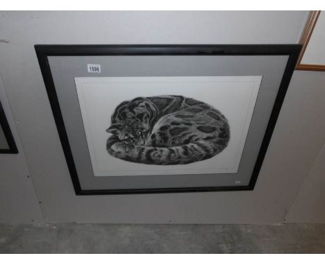 A framed and glazed limited edition clouded leopard print entitled 'Serenity' by Gary Hodges, signed