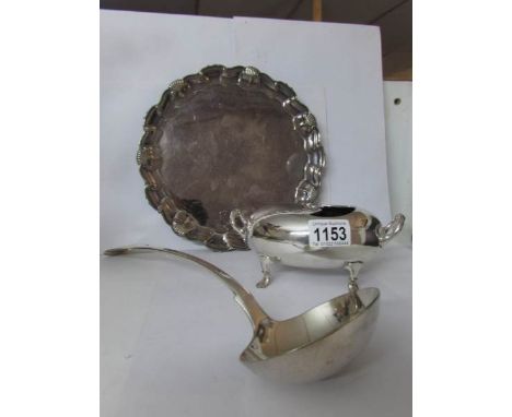A silver plated tray, silver plated spoon warmer and silver plated ladle 