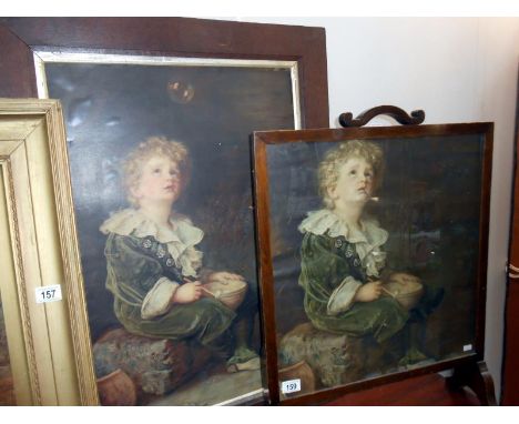 A framed and  glazed 'Bubbles' print and a 'Bubbles' fire screen