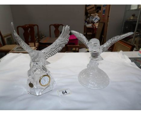 A glass owl figure and a glass eagle as a clock