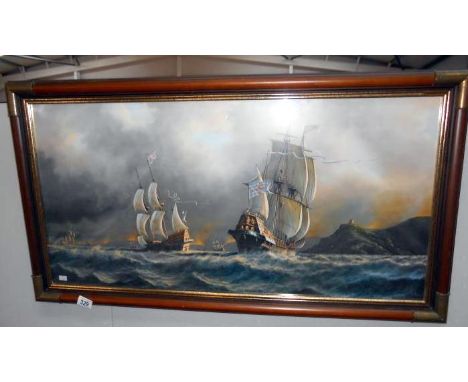 A framed and glazed seascape