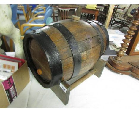 An oak wine barrel on stand