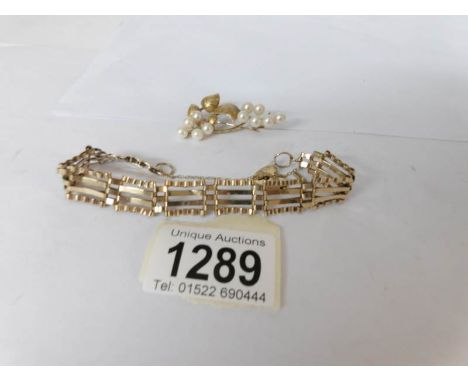 A 9ct gold gate bracelet and a gold brooch set pearls