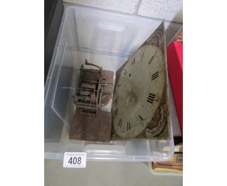 A 30 hour Grandfather clock movement with painted dial