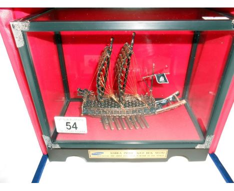 A cased display model from Samsung Heavy Industries being the first iron clad warship Korea Pride (Keo Buk Seon)