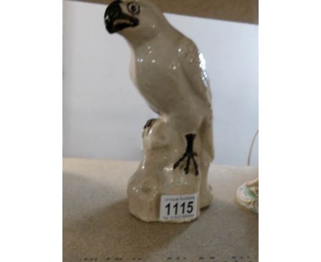A cream ceramic falcon, possibly Japanese