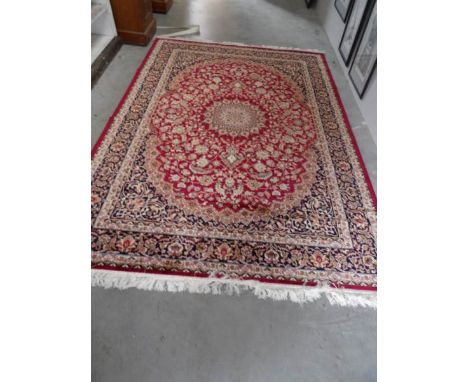 A red ground Keshan carpet, 230 x 160 cm