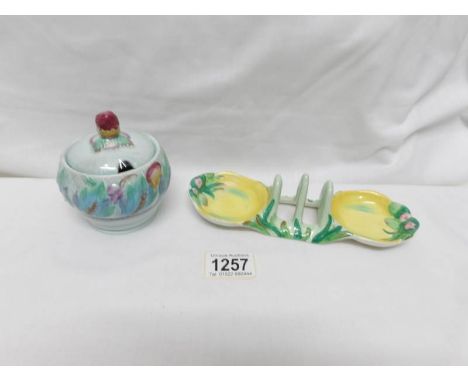 A Clarice Cliff conserve pot and toast rack A/F