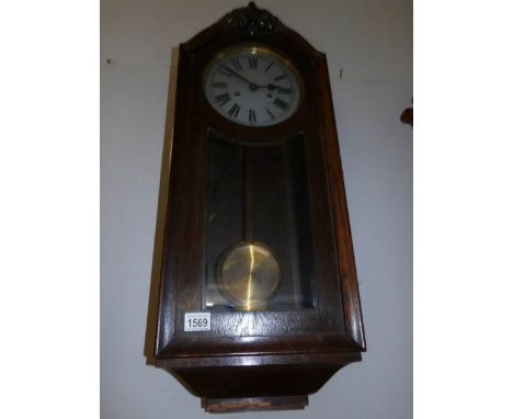 An oak wall clock