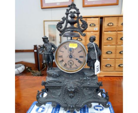 A 19th century French spelter alarm clock in working order