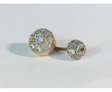 A 9ct gold belly button stud