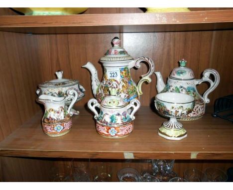 5 pieces of Capo di Monte tea ware and one other item