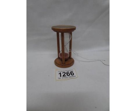 A Mauchlin ware egg timer