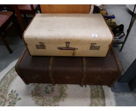A cabin trunk and a suitcase