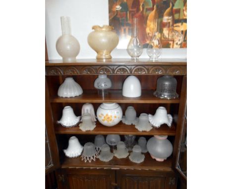 A large quantity of glass lamp shades