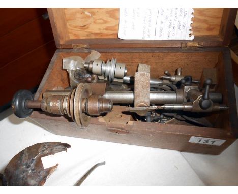 A quantity of watch makers tools including lathe