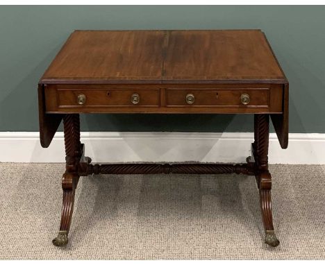 REGENCY STYLE MAHOGANY SOFA TABLE having two drawers, twin flaps, turned supports and cross stretcher, reeded splayed feet, b