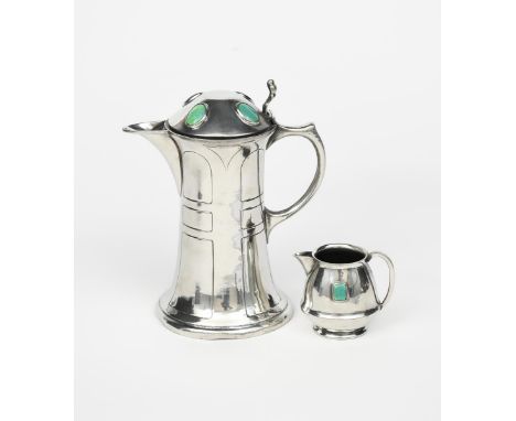 An Art Nouveau Hutton Secessionist pewter coffee pot and milk jug, model no.0599,  the coffee pot with simple geometric panel