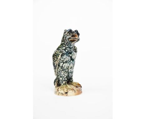 A rare Martin Brothers stoneware miniature bird,  dated 1913,  modelled standing with webbed feet, wings tucked behind its ba