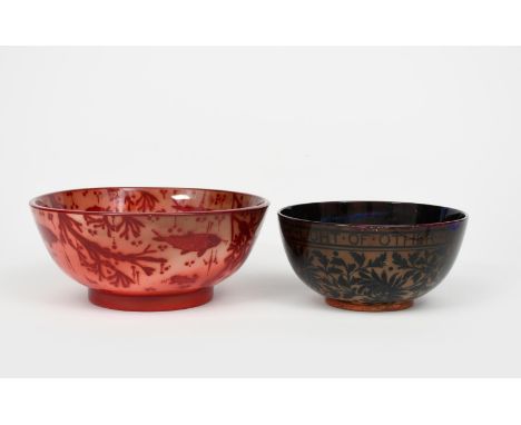 A Bernard Moore pottery bowl, on Minton's blank, painted to the interior and exterior with scaly fish swimming amongst waterw