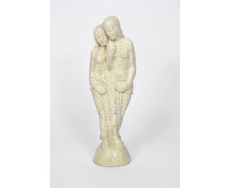 A Goldscheider Pottery figure of two  huddling naked women,  partially wrapped in a towel, covered in a crackled cream glaze 