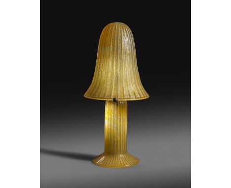 A large and impressive Daum Nancy acid etched table lamp,  mushroom shaped amber glass shade with vertical acid etched column
