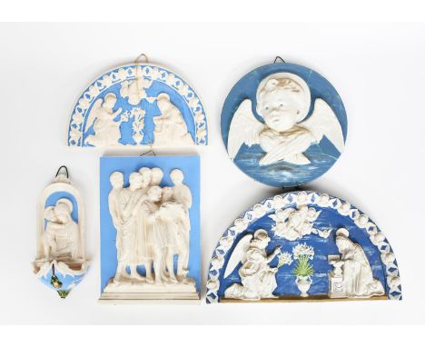 'The Annunciation' a Cantagalli Della Robbia style pottery wall plaque, semi-circular form, modelled in low relief, glazed in