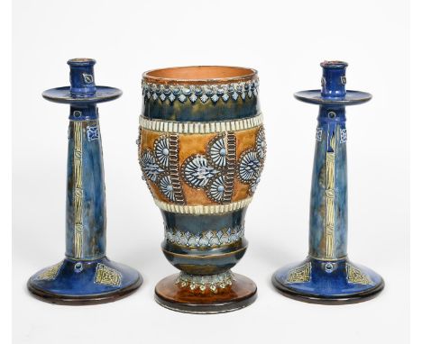 A Doulton Lambeth stoneware oil lamp base by Mark V Marshall, dated 1882, incised with columns of grotesque lizard creatures 