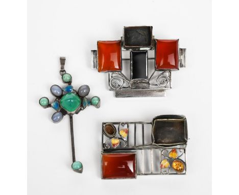 A George Hunt silver  and enamel bar brooch,  modelled as a stylised tree, with enamelled blue tree and set with green and la