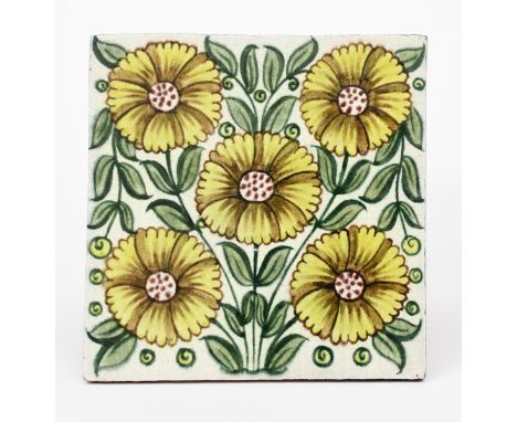A William De Morgan Bedford Park Anemone tile,  painted with five flowers in shades of yellow, green and aubergine on a white