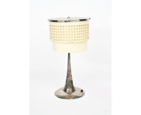 A Secessionist enamelled metal table lamp, in the manner of  Josef Hoffman at the Wiener Werkstatte, the pierced drum shade e