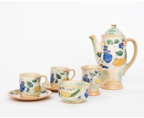 A Royal Doulton 'Brangwyn Ware' Harvest coffee set for two designed by Frank Brangwyn,  decorated with a band of grape, fruit